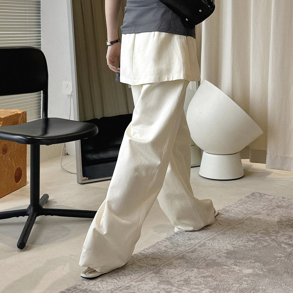 High-waisted Tencel cotton wide-leg pants in relaxed draped silhouette