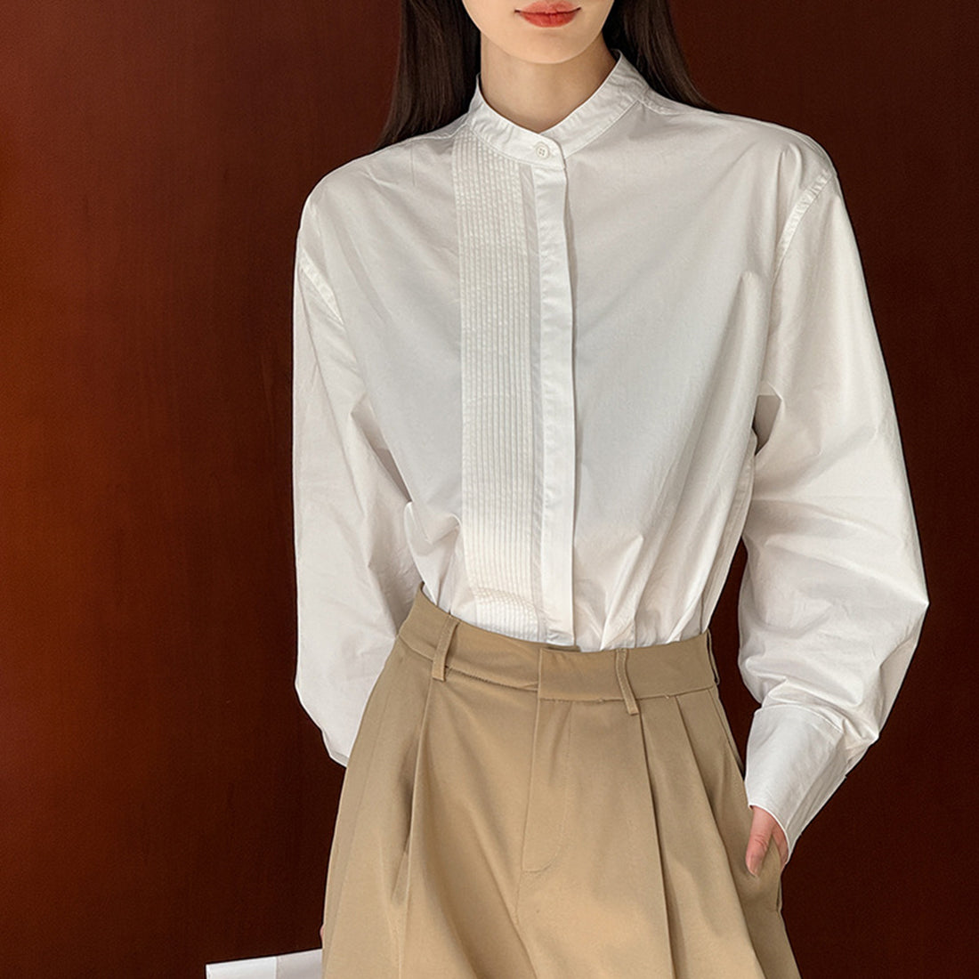 Wrinkled round neck long sleeved shirt