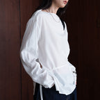 Asymmetric diagonal buckle strap waist cinching shirt top