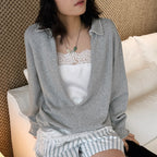 Oversized V-neck pullover sweatshirt with raw edge collar and relaxed fit
