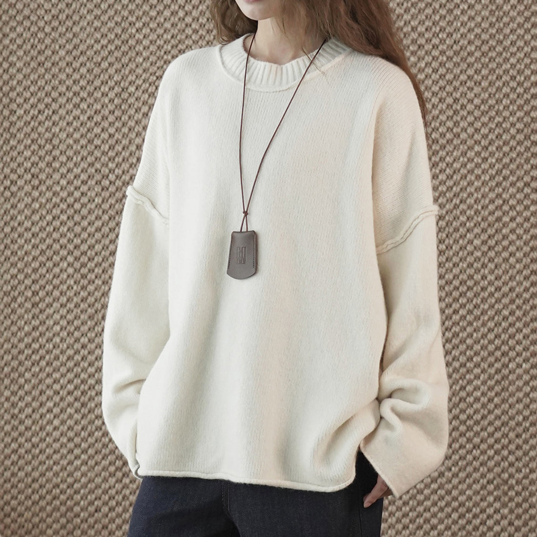 Round neck slightly frayed knitted loose sweater
