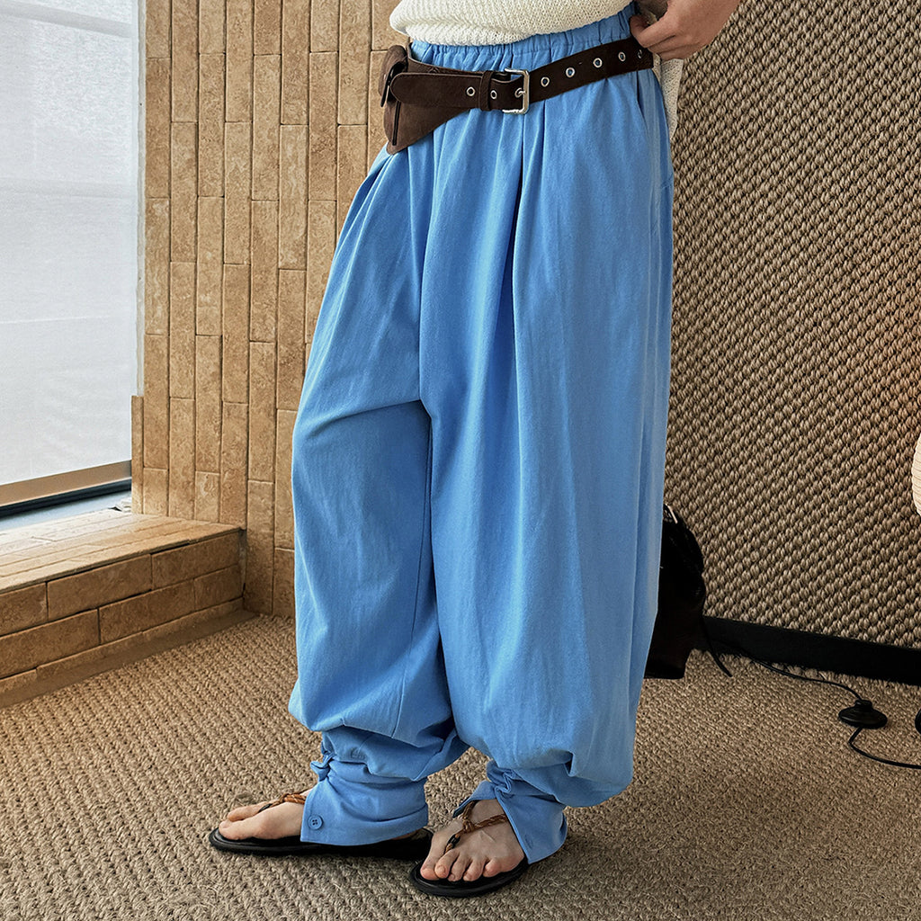 Loose fit high waist draped cuffed pants