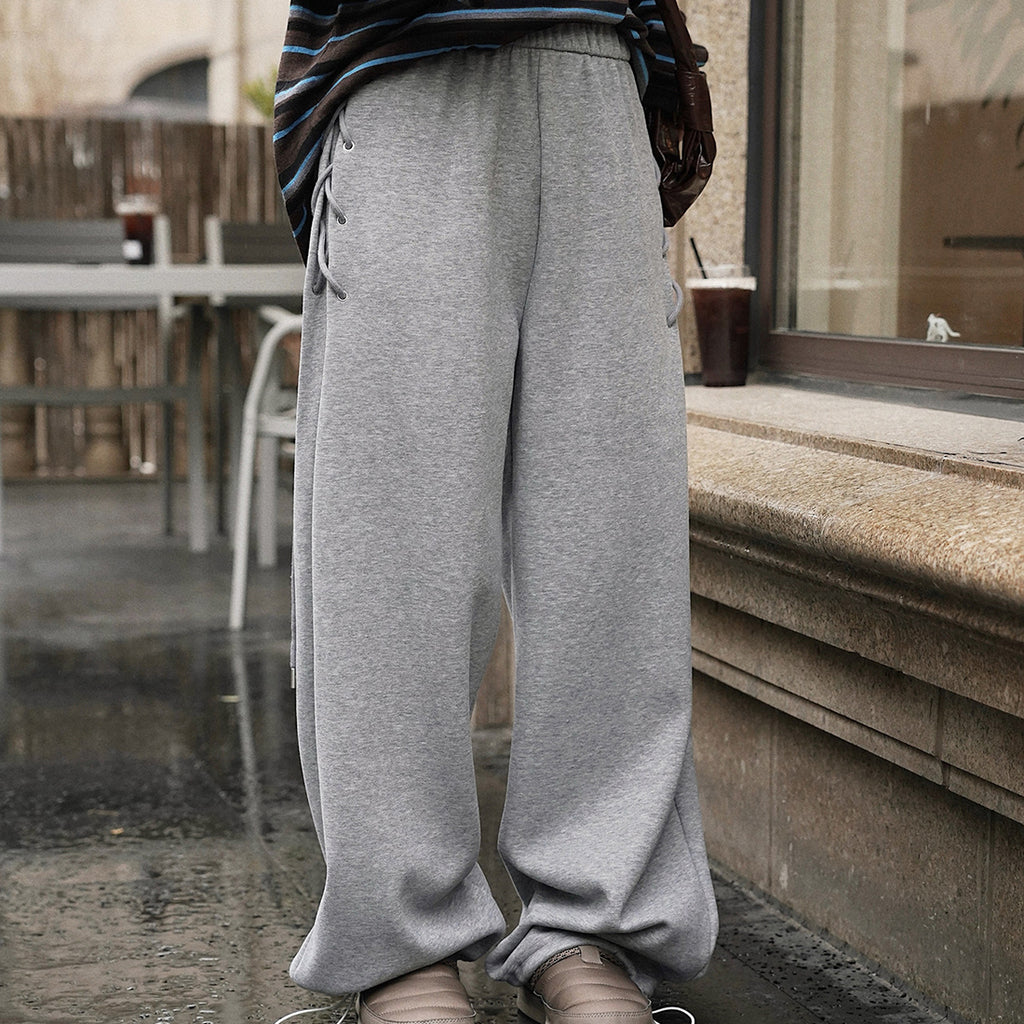 Elastic high waisted side straps and loose wide leg pants