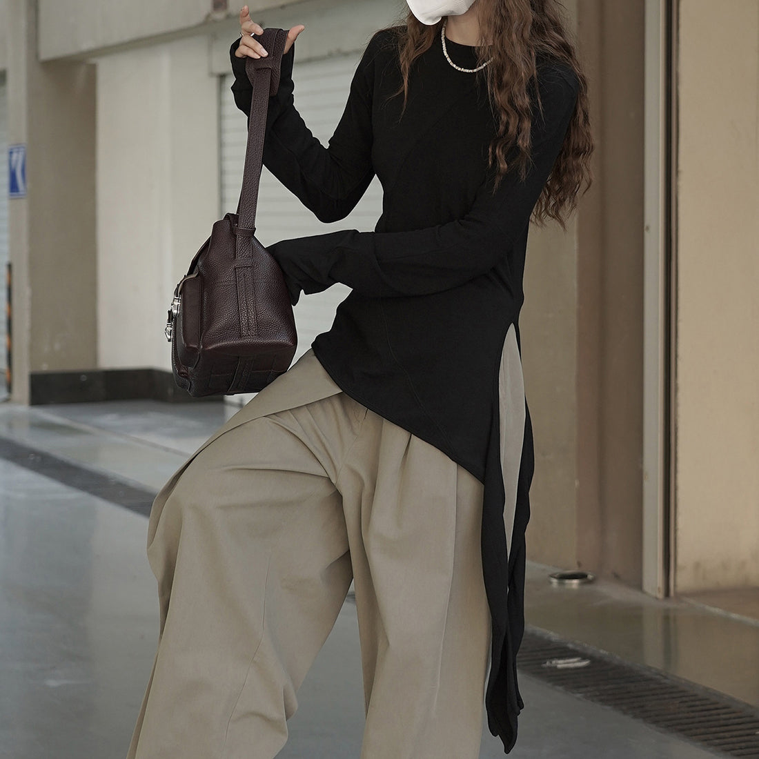 Asymmetric curved strap slim fit top