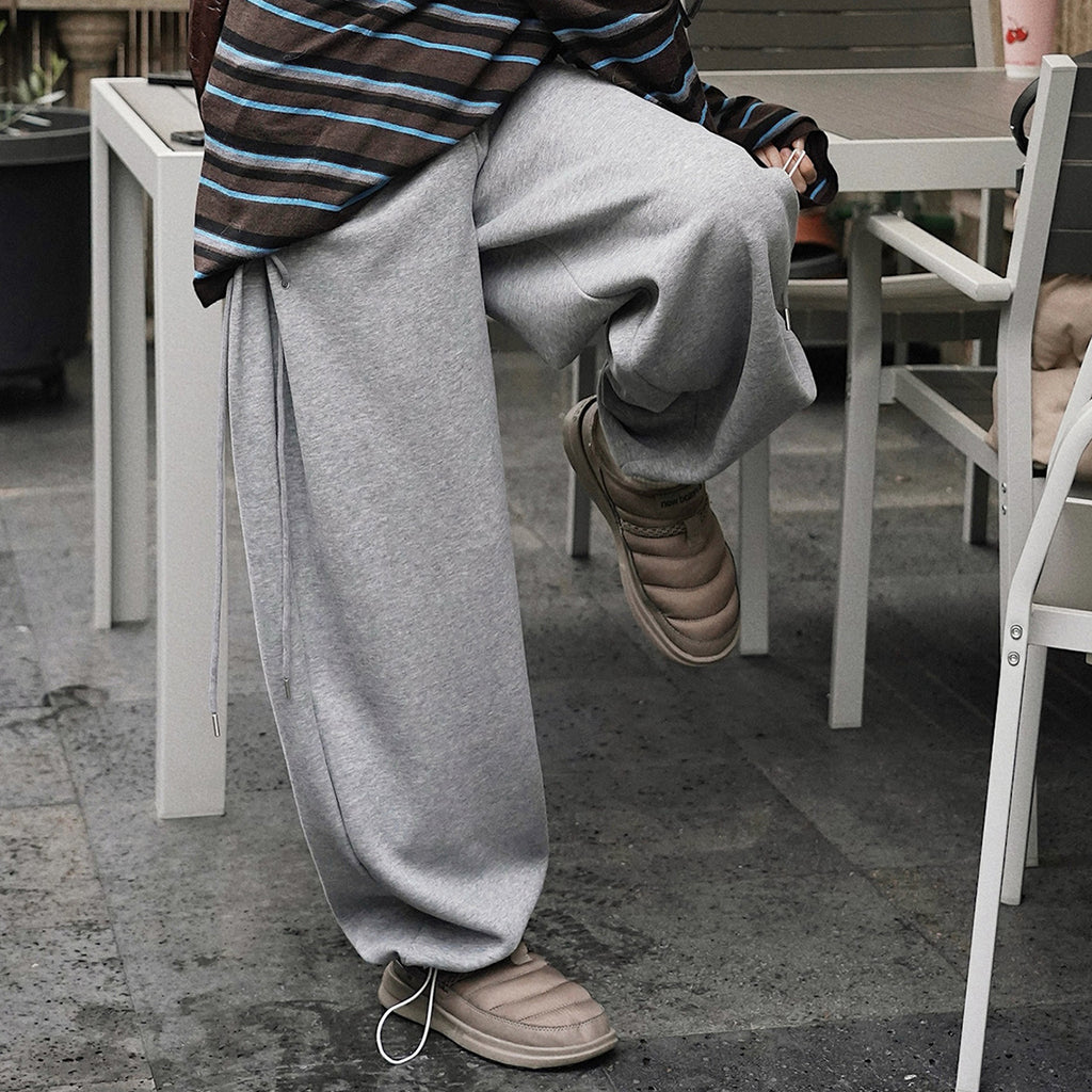 Elastic high waisted side straps and loose wide leg pants