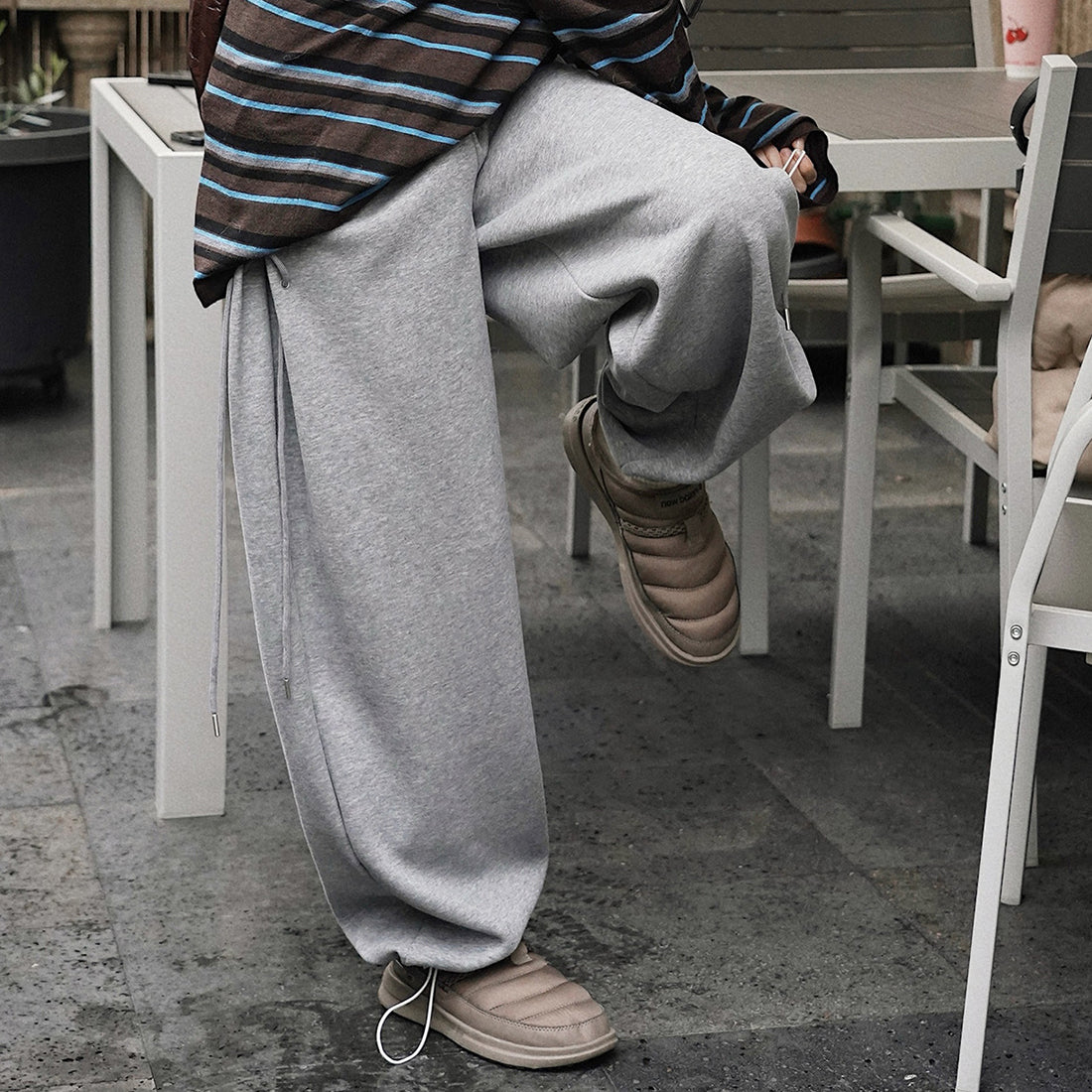 Elastic high waisted side straps and loose wide leg pants