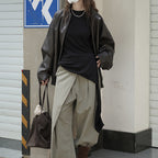 Asymmetric curved strap slim fit top