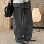 High-waisted Tencel cotton wide-leg pants in relaxed draped silhouette