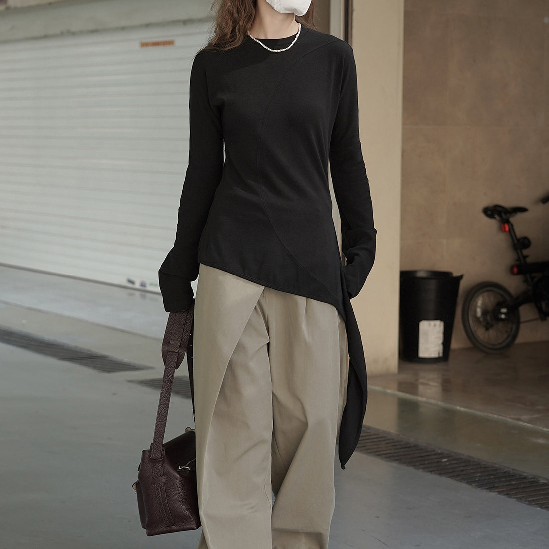 Asymmetric curved strap slim fit top