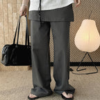 High-waisted Tencel cotton wide-leg pants in relaxed draped silhouette