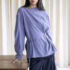 Asymmetric diagonal buckle strap waist cinching shirt top