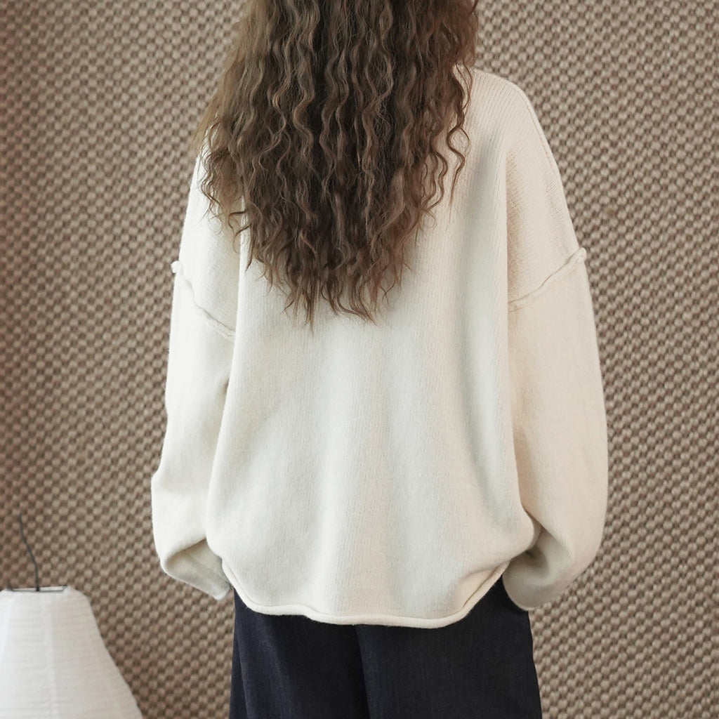 Round neck slightly frayed knitted loose sweater