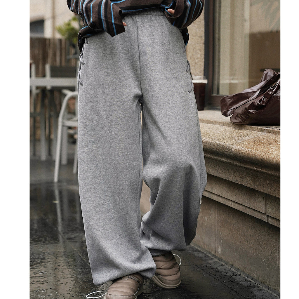 Elastic high waisted side straps and loose wide leg pants