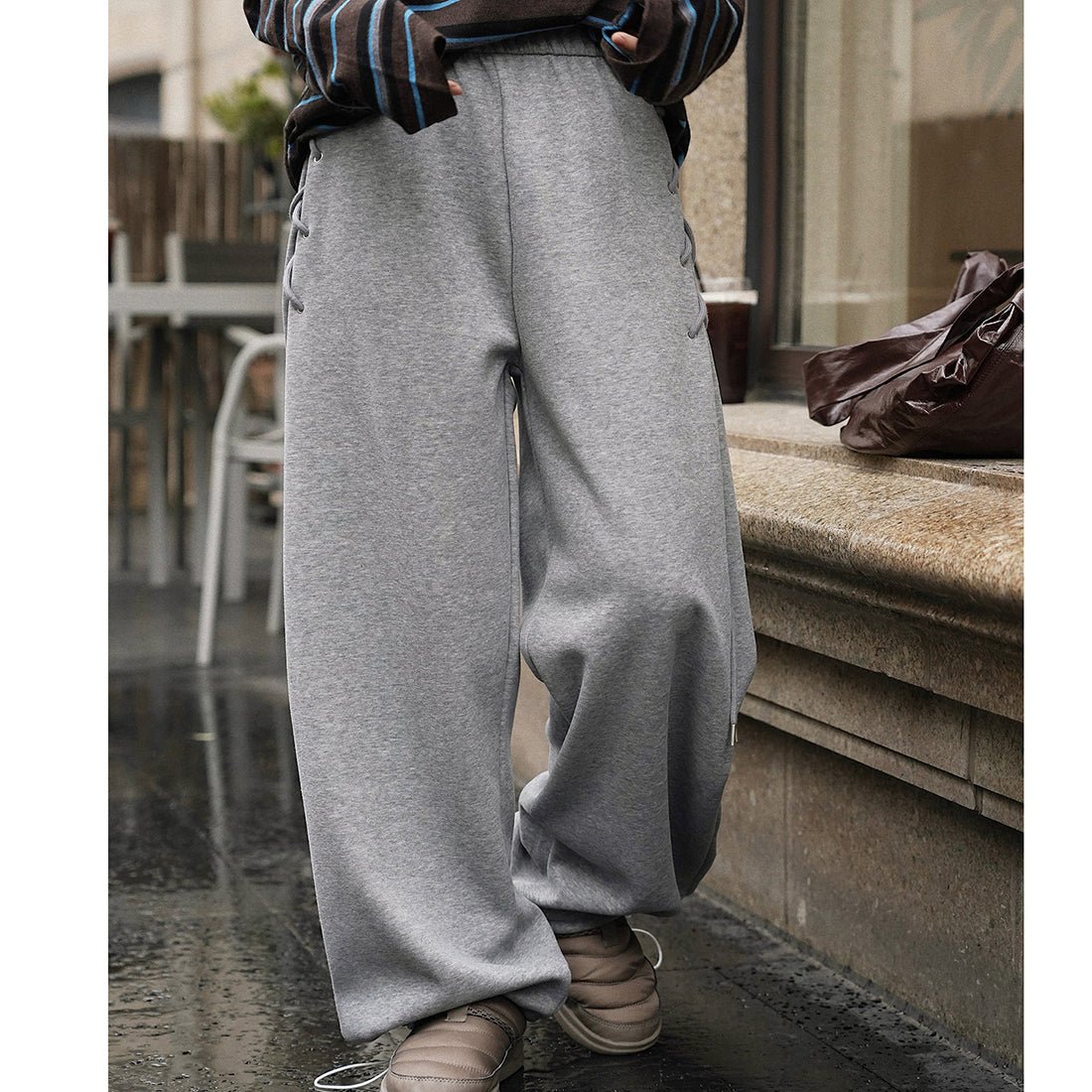 Elastic high waisted side straps and loose wide leg pants