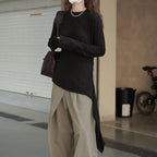 Asymmetric curved strap slim fit top