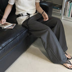 High-waisted Tencel cotton wide-leg pants in relaxed draped silhouette