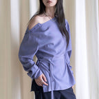 Asymmetric diagonal buckle strap waist cinching shirt top