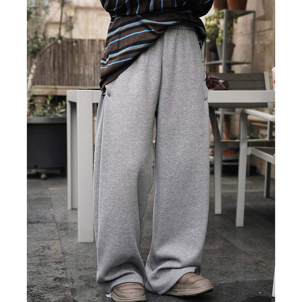 Elastic high waisted side straps and loose wide leg pants