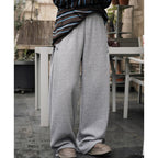 Elastic high waisted side straps and loose wide leg pants