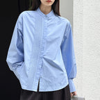 Wrinkled round neck long sleeved shirt