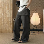High-waisted Tencel cotton wide-leg pants in relaxed draped silhouette