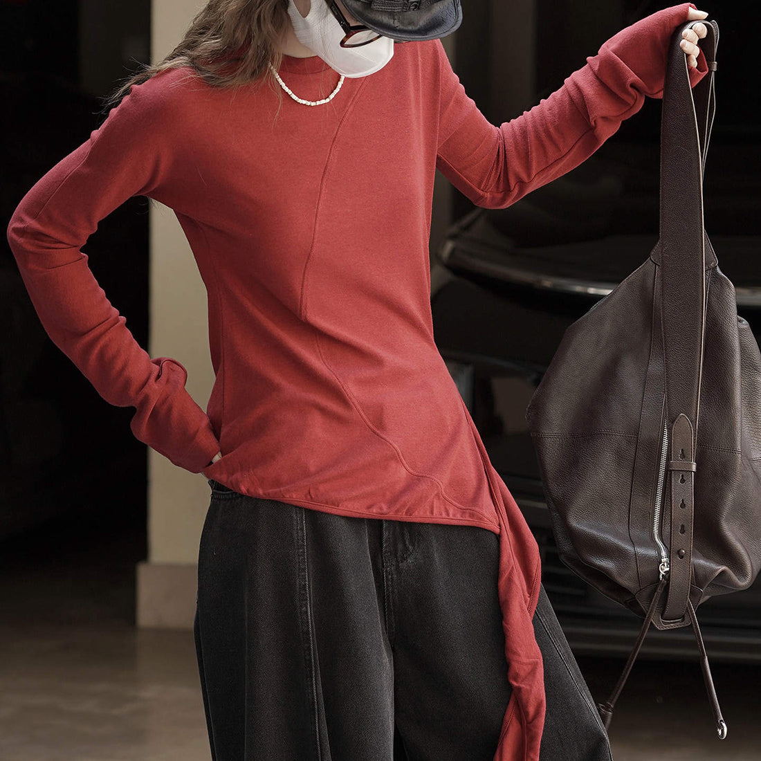 Asymmetric curved strap slim fit top