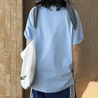 Simple round neck loose hem with micro slits on both sides T-shirt top